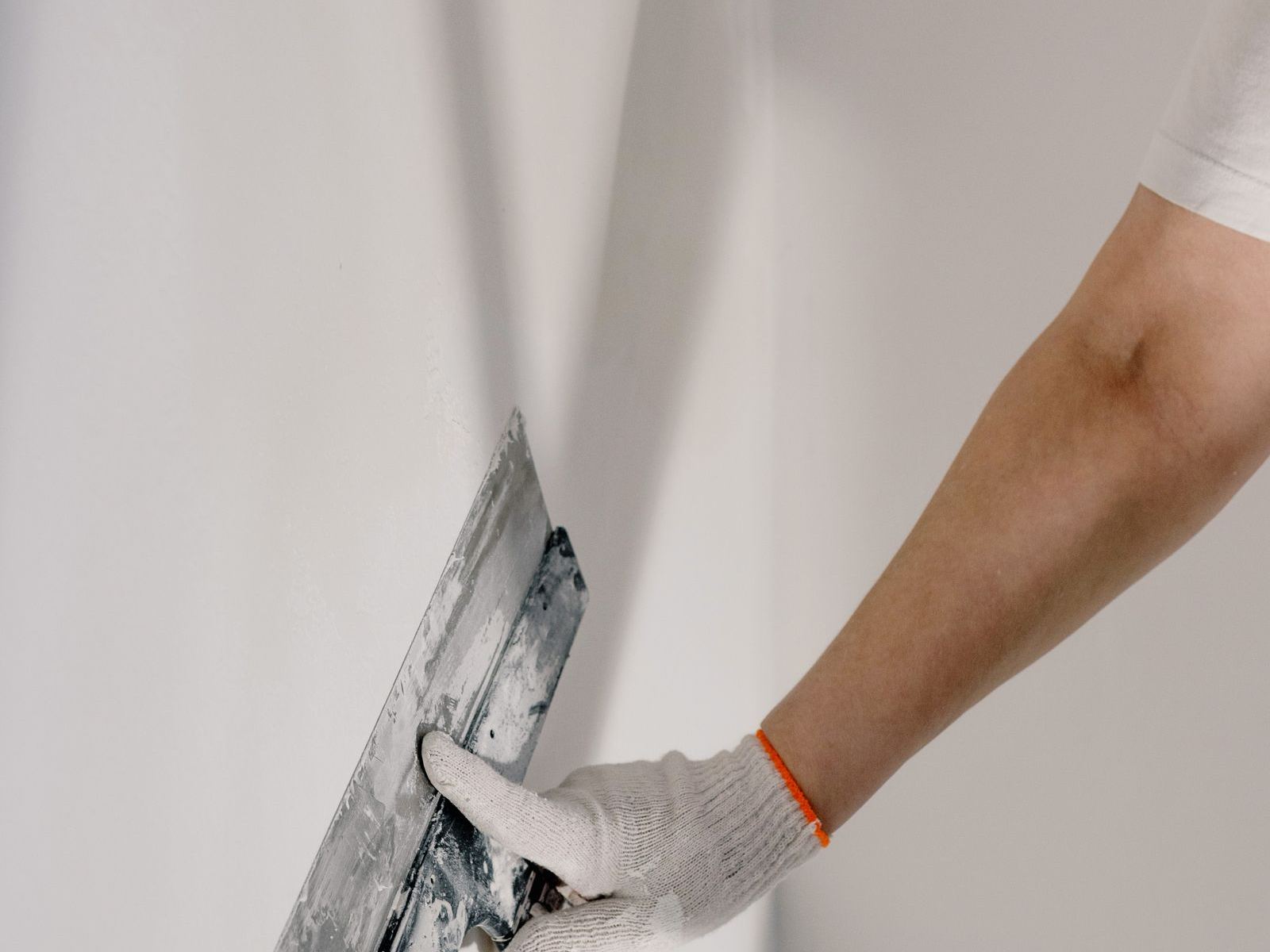 Drywall patching with a putty knife