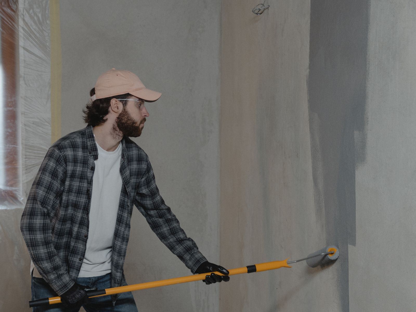 Painting an interior wall with a roller